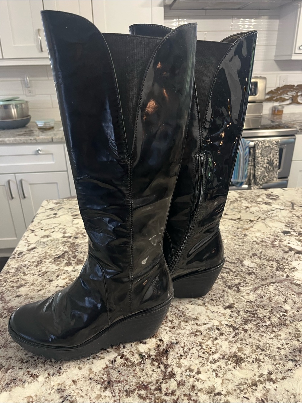 Fly London Women's Black Patent Wedge Boots